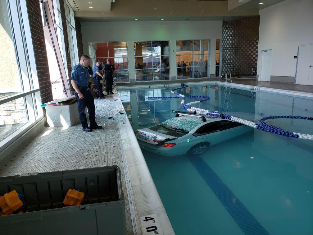 Car Crashes into LA Fitness Goes Into Pool Where People are