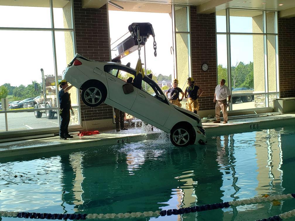 Car Crashes into LA Fitness Goes Into Pool Where People are