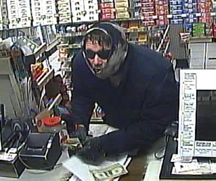 Search underway for armed robbery suspect at Portage gas station