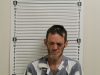 Warrant Suspect Found Hiding Under Clothes in Vehicle Subdued After Refusing to Come Out